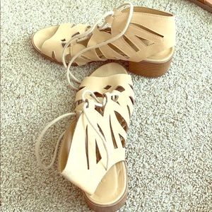 Lace up sandals with small heel
